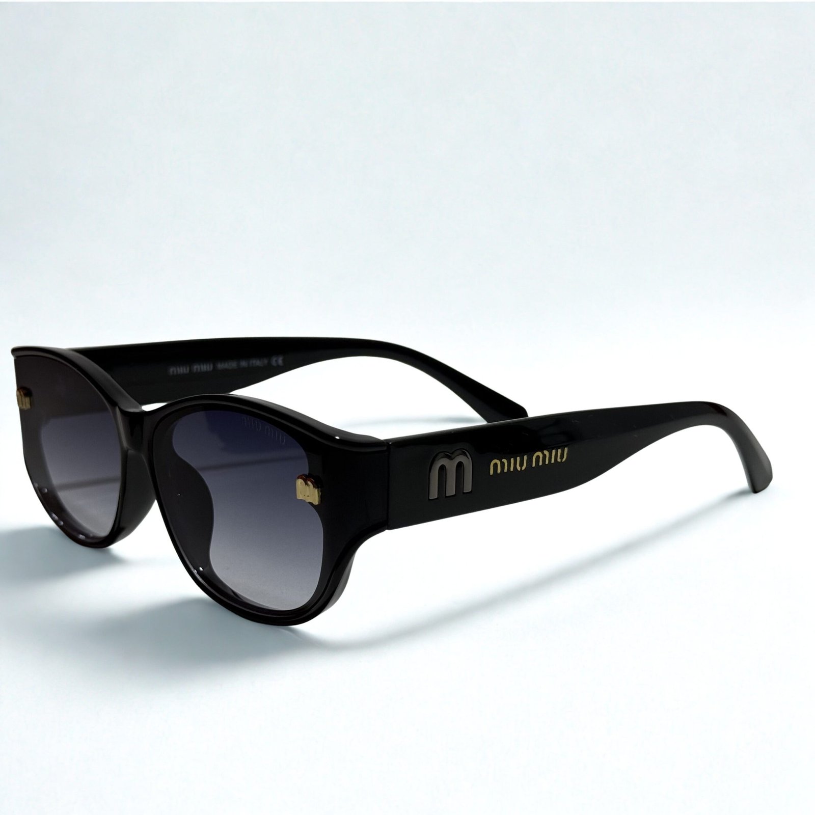 1735324c-9a38-4df0-a817-18d1ca107a95.jpg MIU MIU Γυαλιά Ηλίου - Image 1