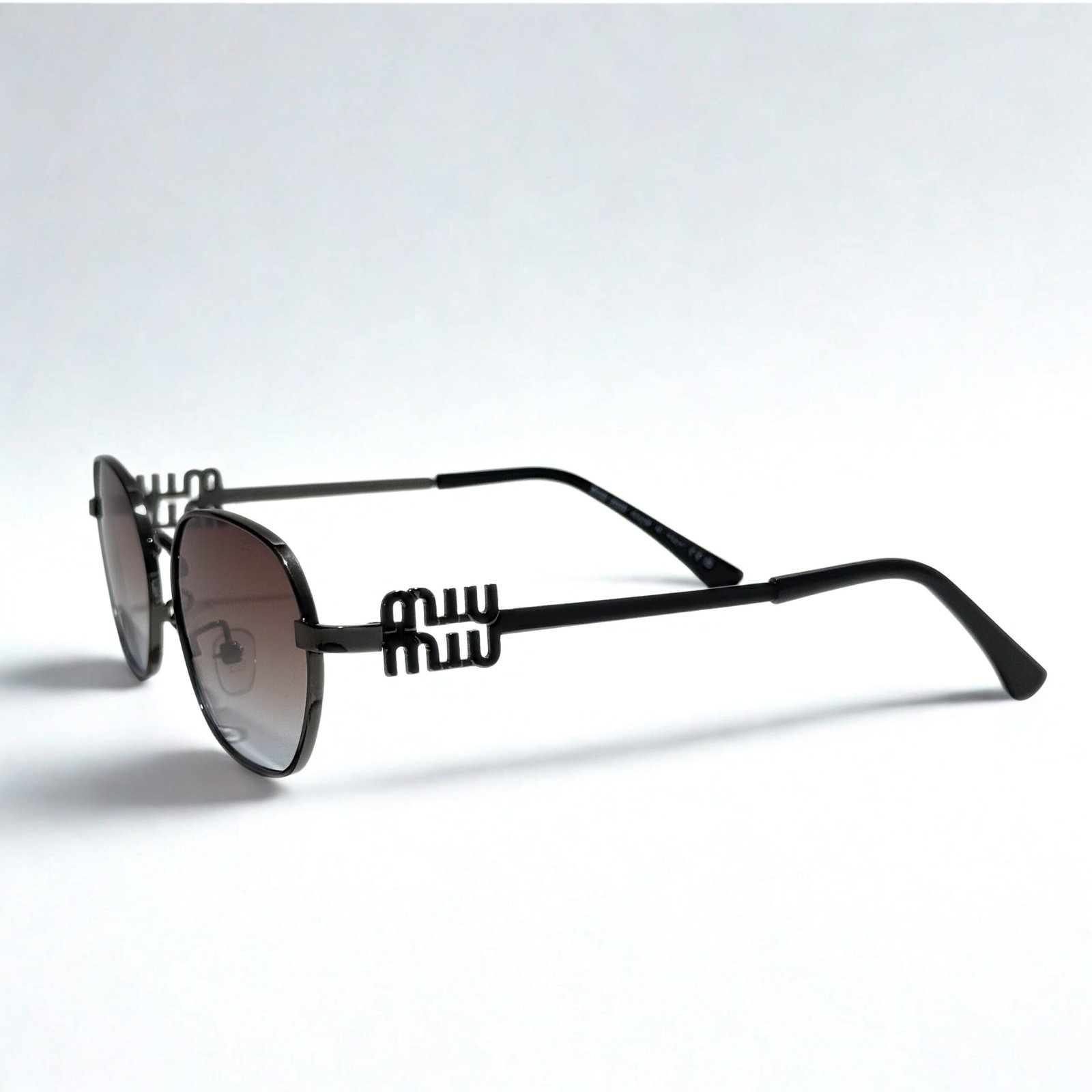 2c7e7559-f49a-481a-af90-8b435ead7423.jpg MIU MIU Γυαλιά Ηλίου - Image 1